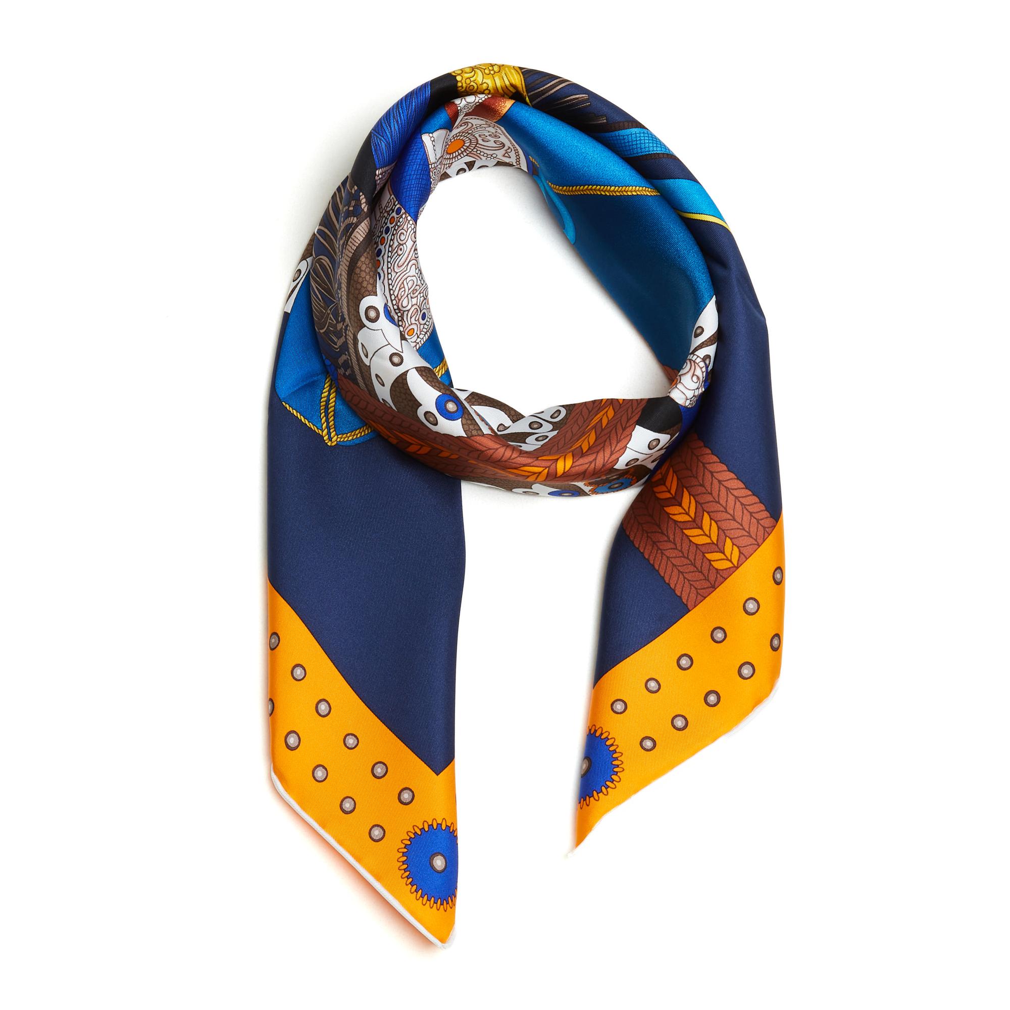Hermès square scarf 90 in silk twill, Selle de dignitaire motif by Wlodek Kaminsky, published in 2018, in shades of navy blue, orange edge. Width 90 cm x length 90 cm approximately. The scarf is in very good condition, crisp silk, well-puffed