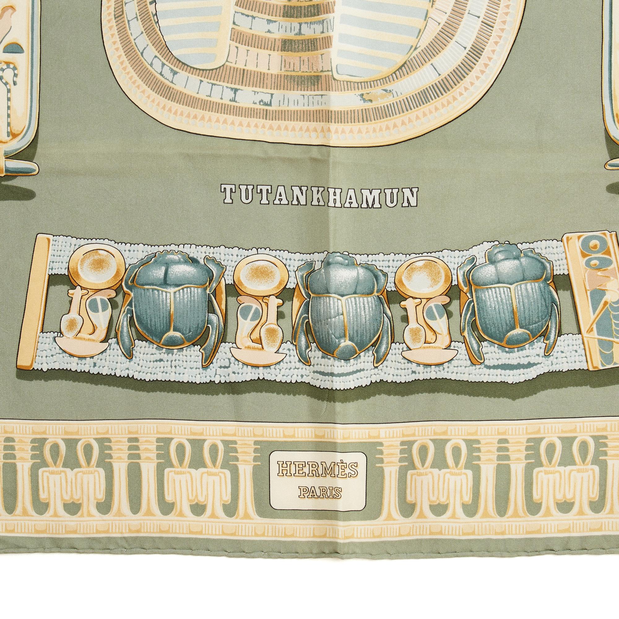 Hermès square scarf 90 in silk twill, Tutankhamun pattern by Vladimir Rybaltchenko (Dimitri's father and himself great-nephew of Philippe Ledoux) published once in 1976 and reissued in 1994 (probably like this one), in shades of pale gray green.