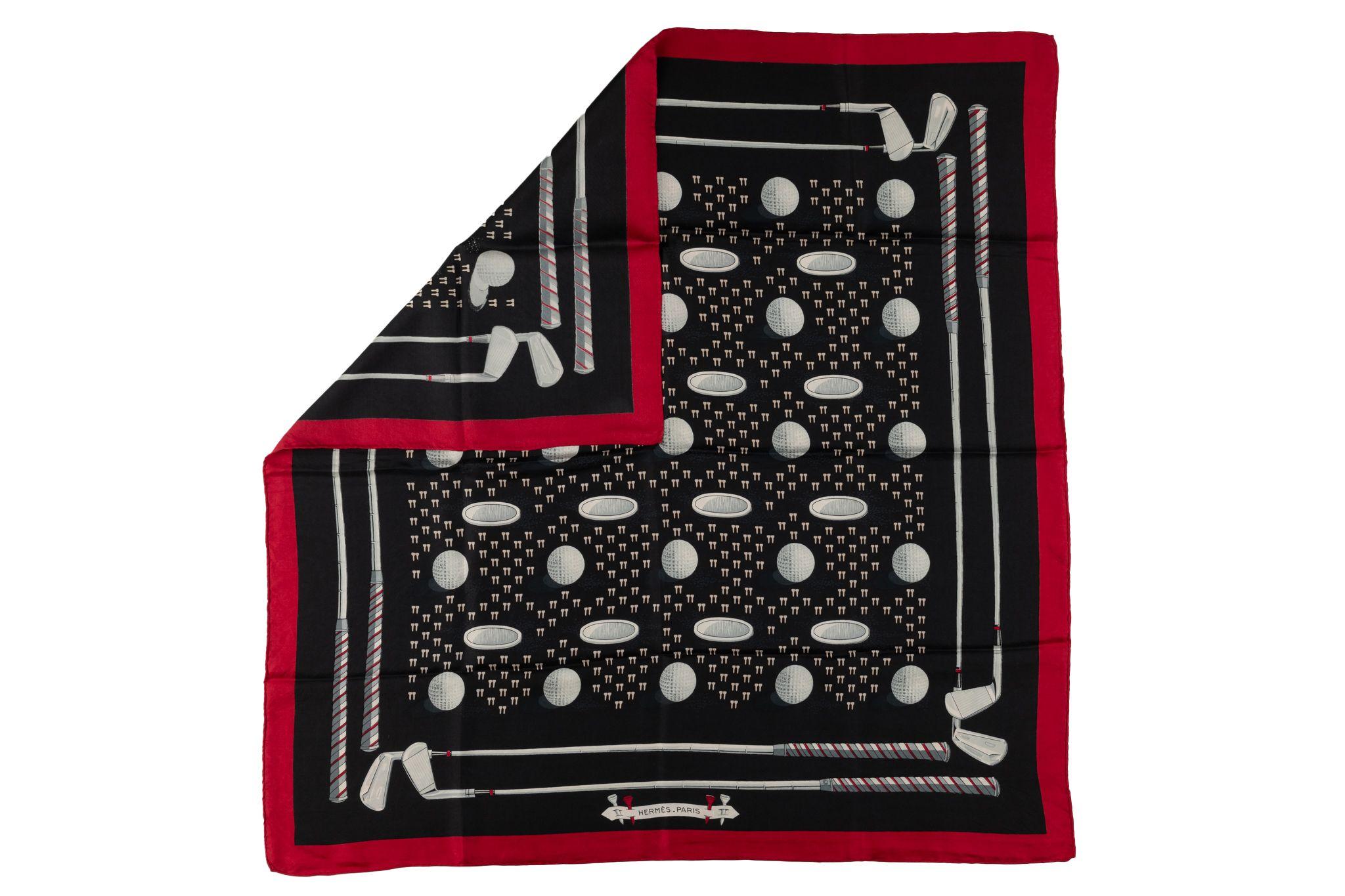 This vintage Hermès Silk twill scarf designed by Christiane Vauzelles in 1963 is a rare find. It features golf balls and clubs amongst a black background and a red border. Comes with no label and no box.