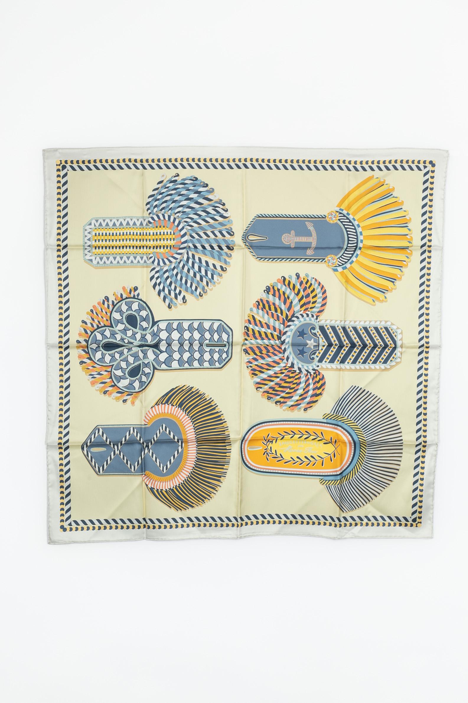 HERMÈS - (Made in France) Dual-sided silk twill foulard topstitched by hand, illustrated with the 'Epaulettes de Gala' (Gala shoulder pads) theme. Piece from sales.

Condition:
Very good condition

Dimensions:
about 89 cm x 89 cm

SKU:FFH77