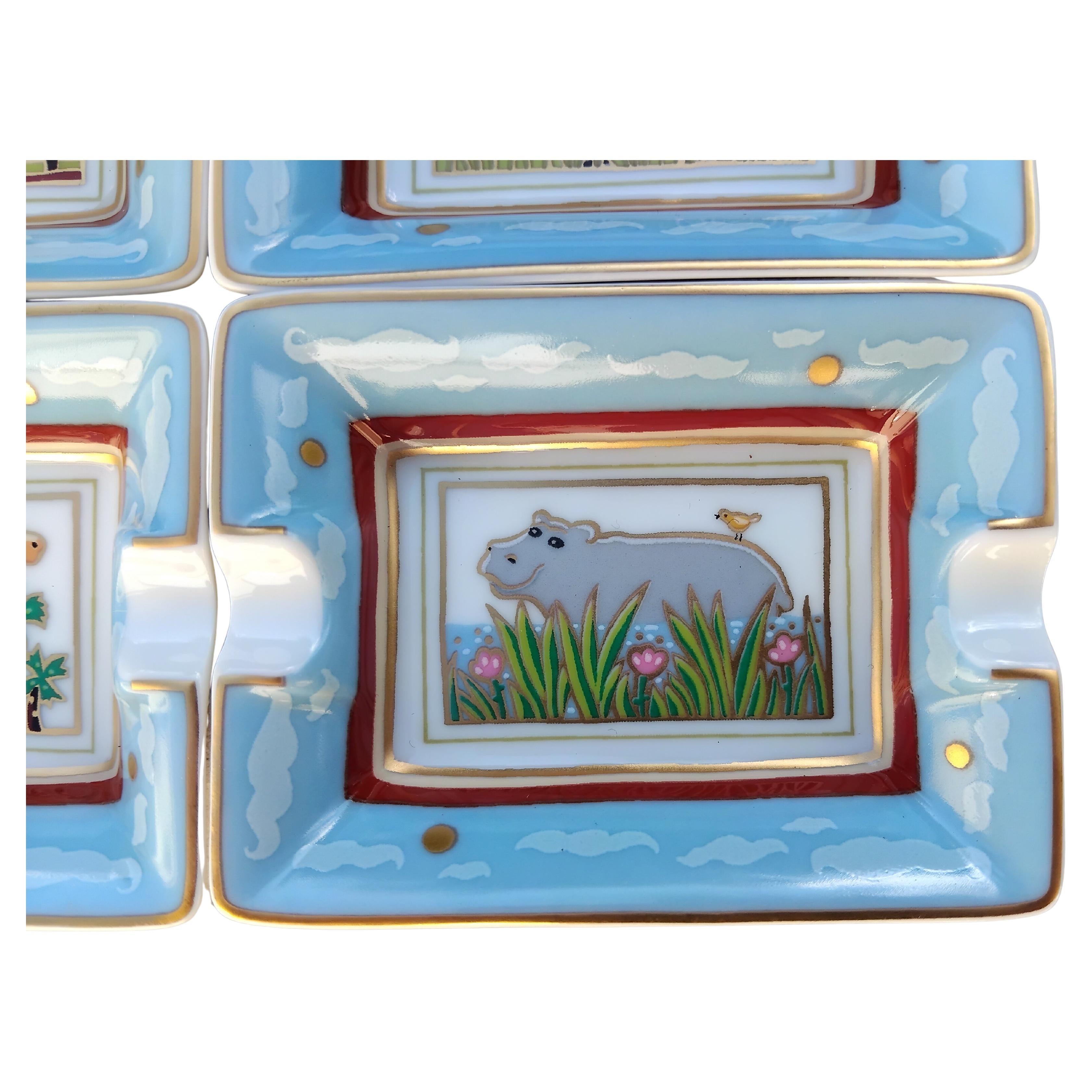 Hermès Cuatro Ceniceros Pequeños Bandejas Animales Salvajes Estampado África Porcelana Oro 7