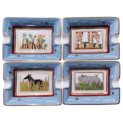 Hermès Four Small Ashtrays Trays Wild Animals Africa Print Porcelain Gold
