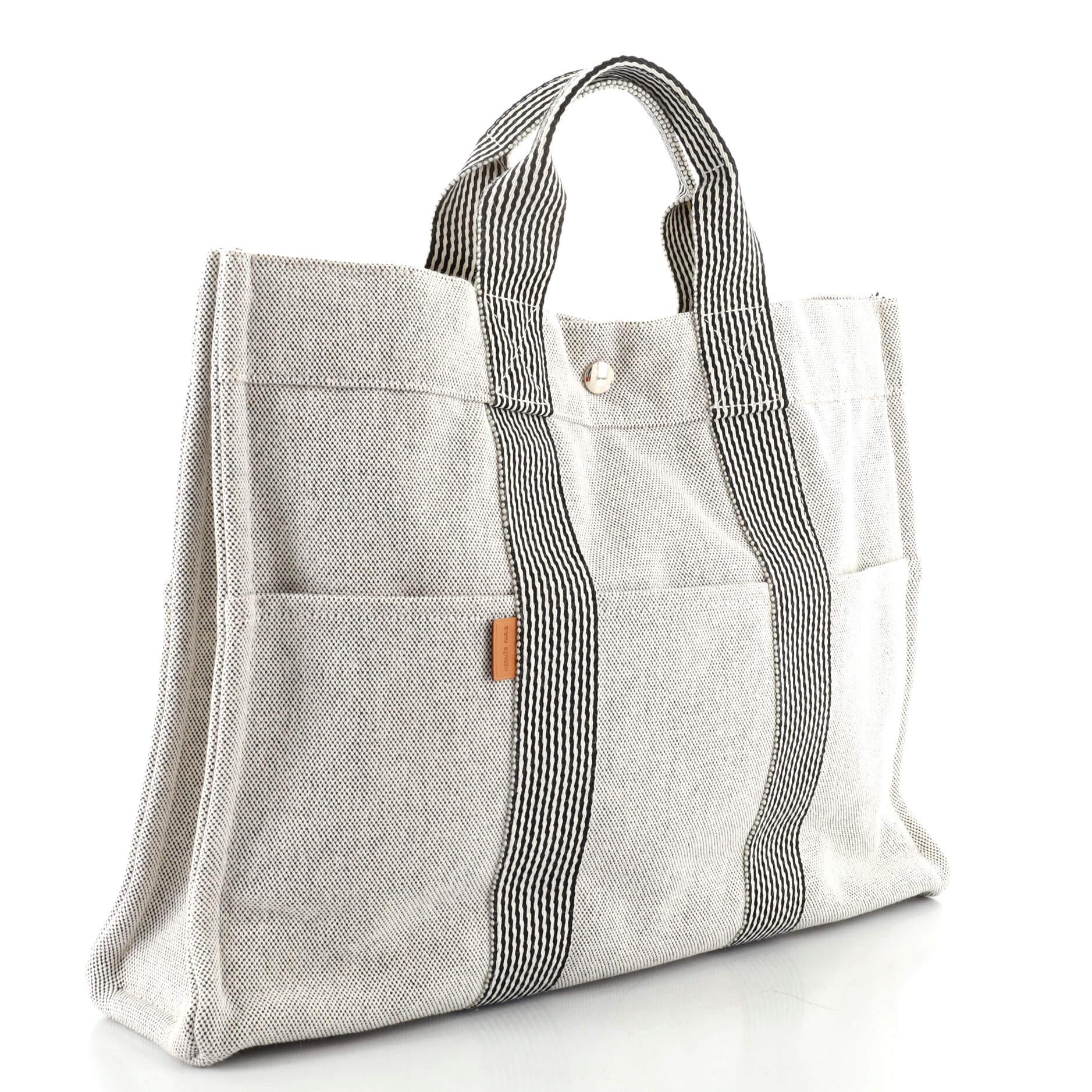 Condition: Very good. Loss of shape on front near base, light wear on exterior and in interior, scratches on hardware.
Accessories: No Accessories
Measurements: Handle Drop 4