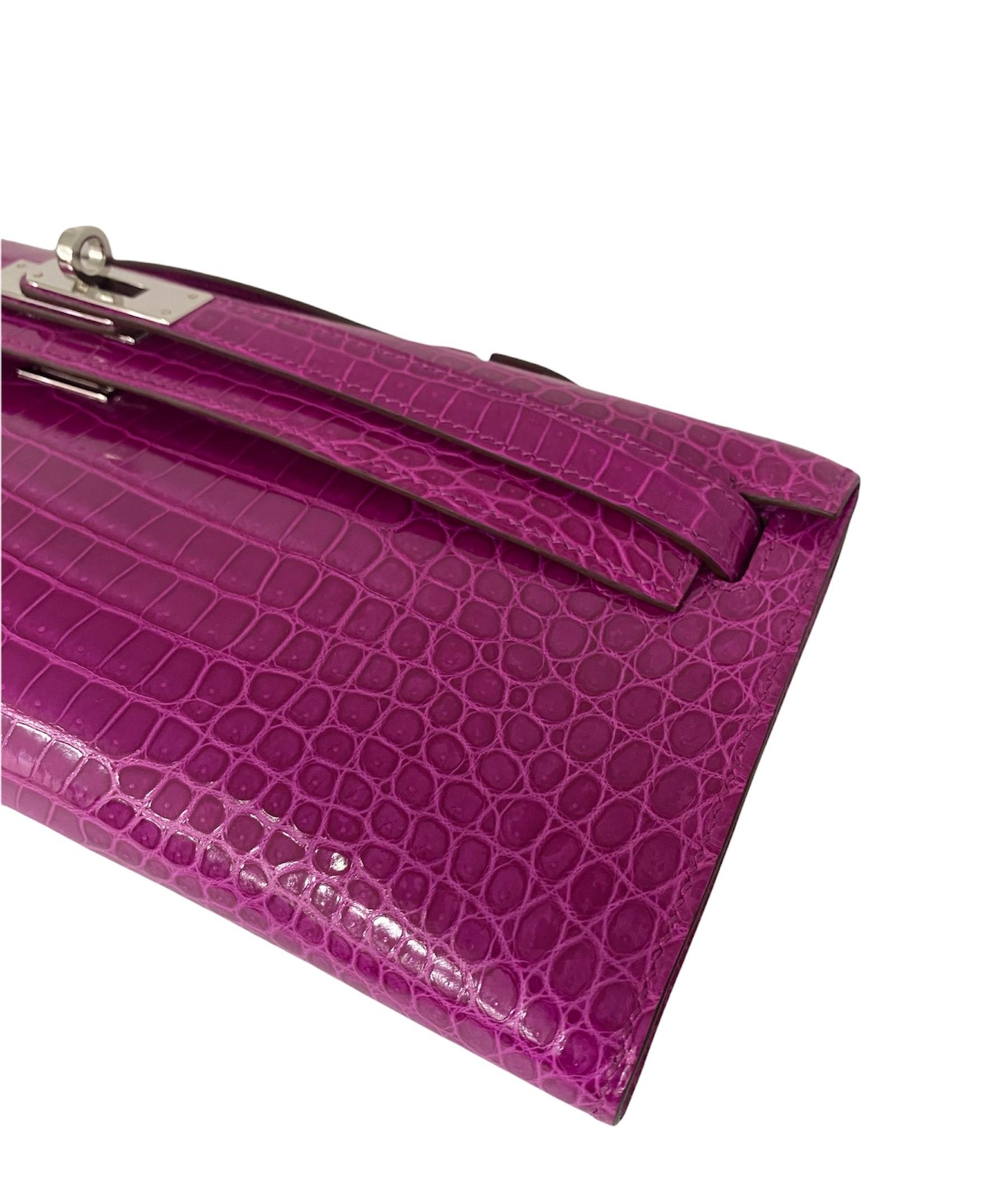 Pochette Kelly Cut in pelle fucsia di Hermès 1