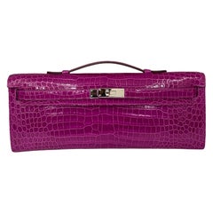 Embrague Kelly Cut de piel fucsia de Hermès