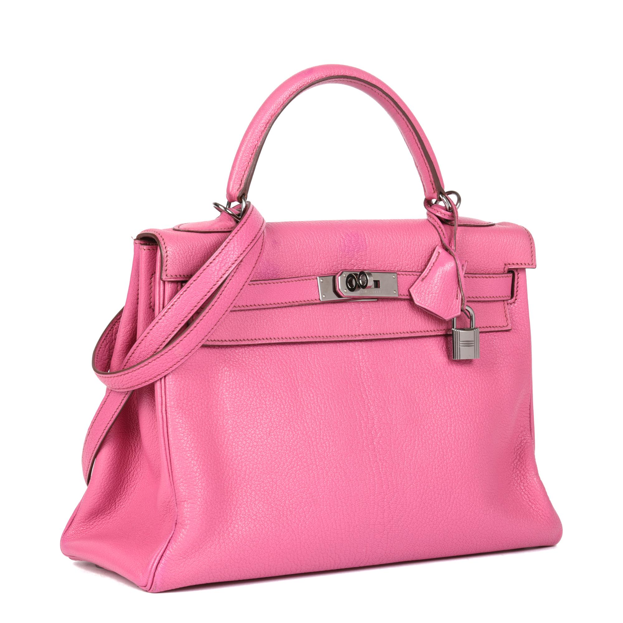 HERMÈS
Fuschia Chevre Leather Kelly 32cm Retourne

Serial Number: [I]
Age (Circa): 2005
Accompanied By: Hermès Dust Bag, Box, Lock, Keys, Clochette, Shoulder Strap
Authenticity Details: Date Stamp (Made in France)
Gender: Ladies
Type: Top Handle,