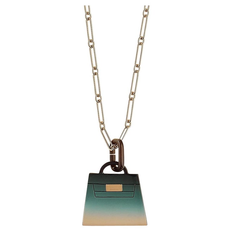 Hermes Fusion Amulette Kelly Pendant By the Sea Necklace Permabrass  Hardware For Sale at 1stDibs