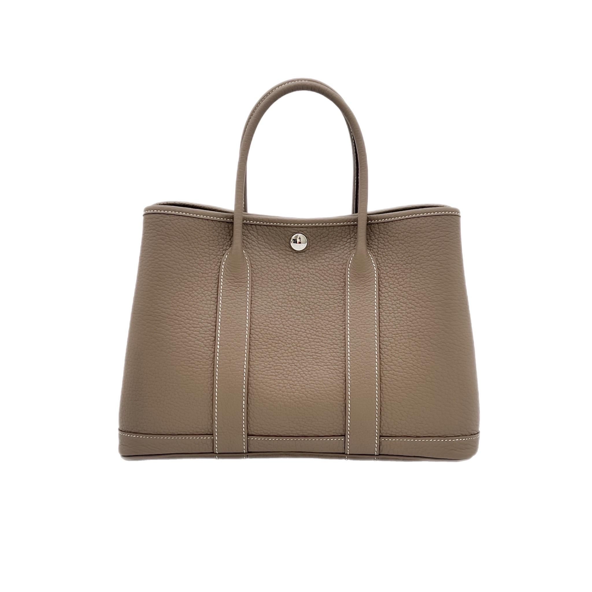 We have a elegant Hermès Garden Party 30 in Etoupe. It is in the Negonda Leather. This beautiful shade of neutral perfection, and is the perfect about town tote.

Condition: Brand new. With original box and dust bag. 