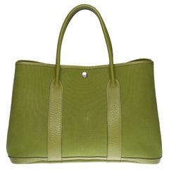HERMES Garden Party 36 Tote in Khaki canvas and leather, blue colvert interior