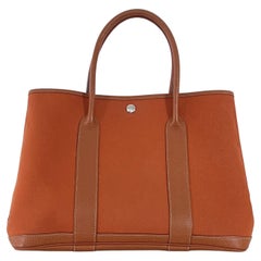 HERMÈS Garden Party Orange Canvas and Leather Handbag 2005 HERMÈS Garden Party Orange Canvas and Leather Handbag 2005