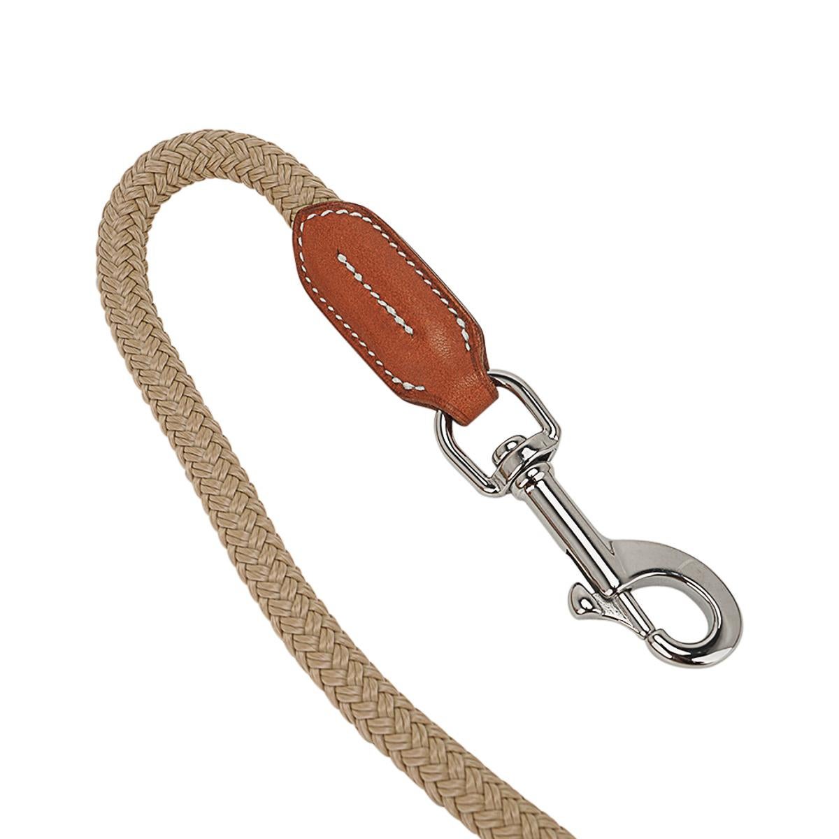Mightychic offers an Hermes Gaucho Dog leash featured in Irish natural bridle leather.
Inspired by the lead rope for horses this fabulous leash will keep your canine
in lock step with fashion.
Saddle stitch detail and it also features codes and