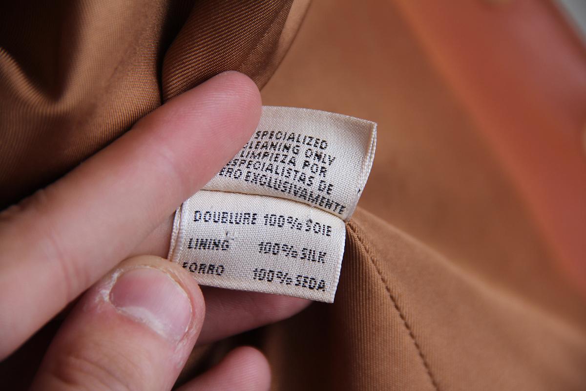 Hermes, tan leather Cavalliere jacket, calfskin with tonal silk lining and top-stitched detail throughout, single breasted , turn down collar with notched lapels, long sleeves with buttoned cuffs, back vent, two front flap pockets, scalloped edge