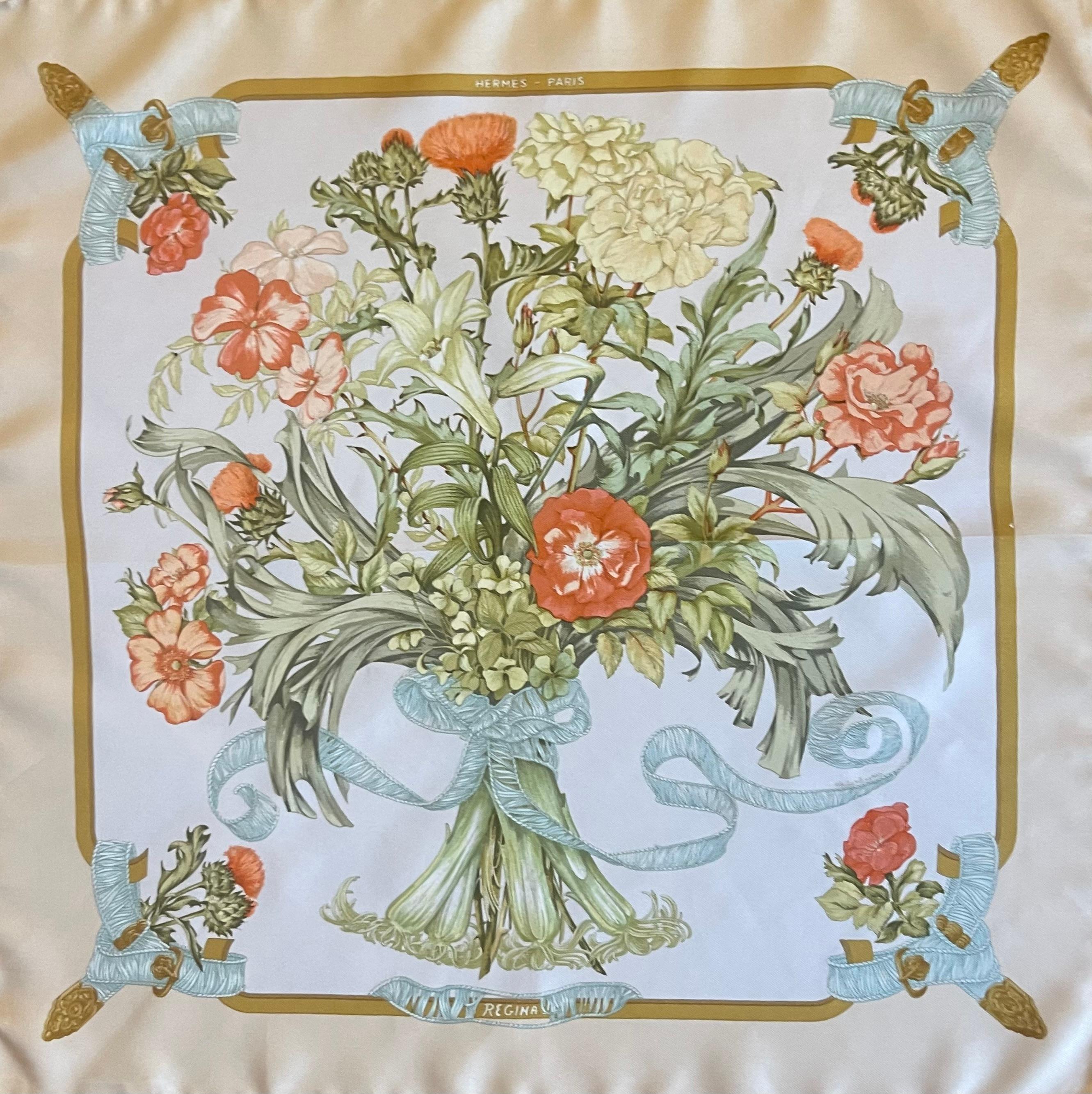 Hermès gavroche Silk scarf “regina” 1977. 
Please note this item is in good condition with minor wear consistent with age and use. This beautiful scarf was designed in 1972 by Leila Mechtai and then reissued in 1977 as a gavroche due to its