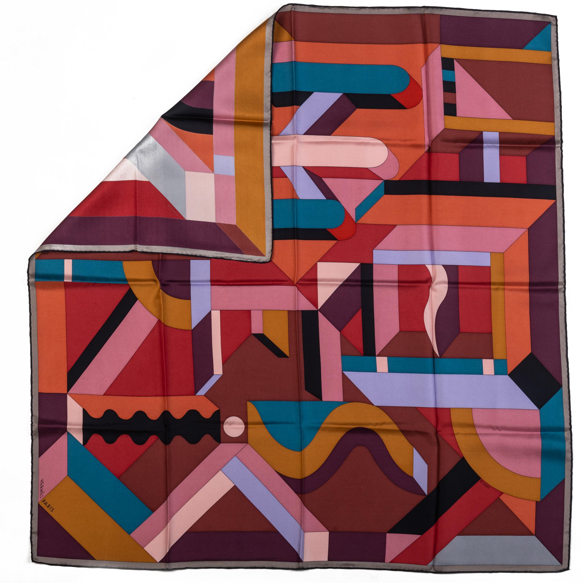 Hermes multicolor geometric silk scarf. Hand rolled edges. No box included.