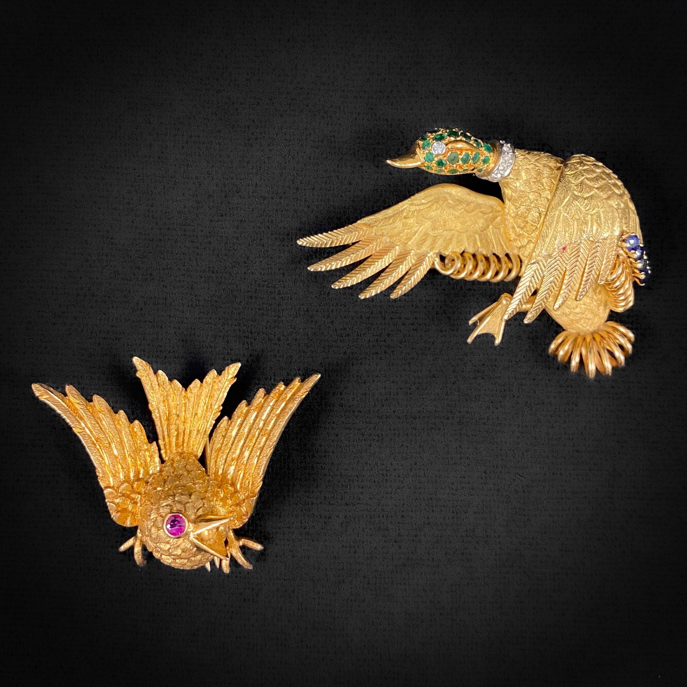 Georges Lenfant for Hermes Paris vintage Duck In Flight emerald, sapphire and diamond brooch in 18kt yellow gold and platinum, French, 1960s/1970s, accompanied by maker’s orange pouch. Modelled as a flying jeweled duck, the body and wings carved to