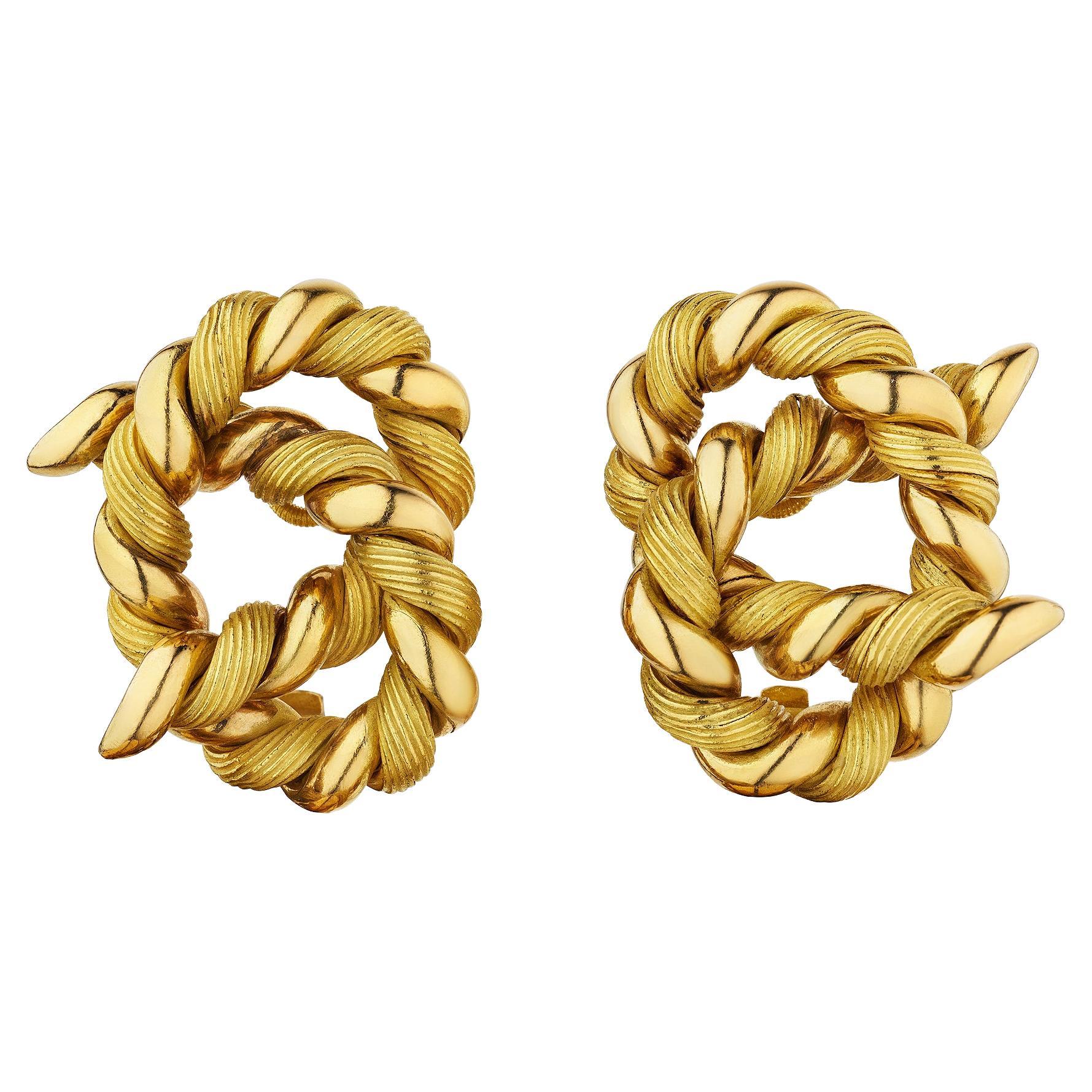 Orecchini Georges L
Enfant Vintage con nodo a clip di Hermes