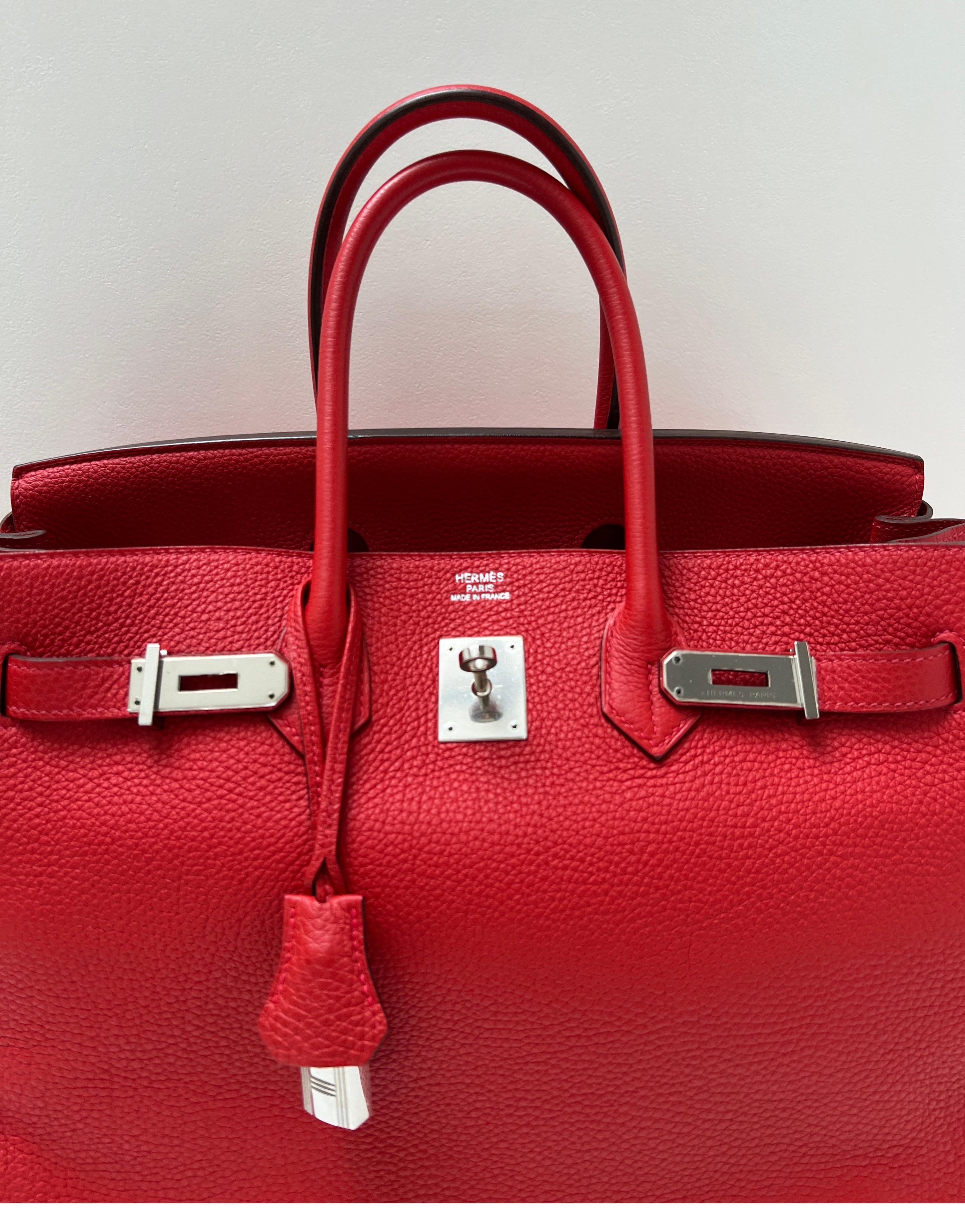 Hermes Red Geranium Birkin 35 Bag. Excellent like new condition. Plastic is still on the hardware. Very giftable. Interior is clean and pristine. Great deal for this condition. Beautiful red color Birkin. Togo leather. Includes clochette, lock,