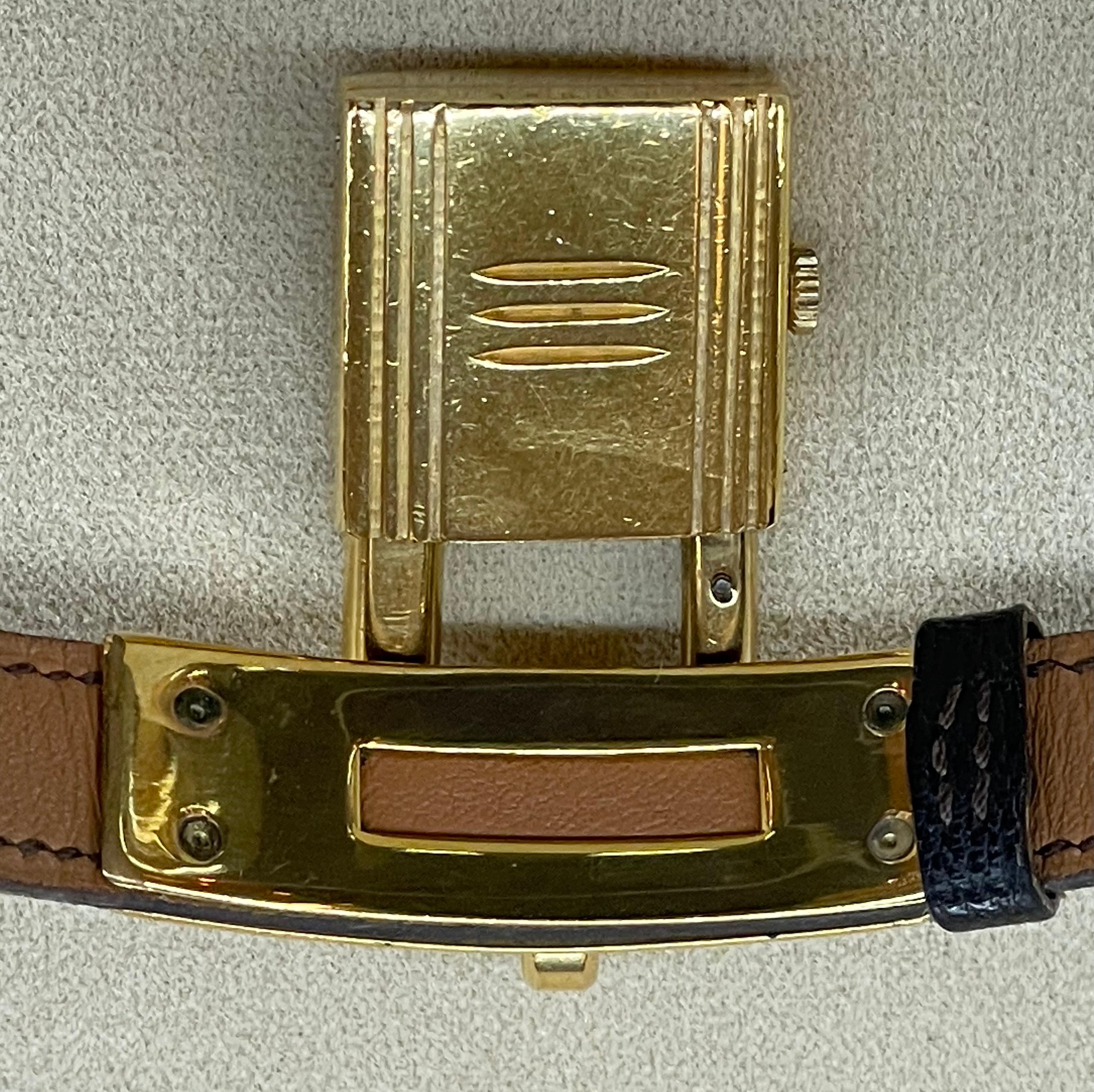 Women's or Men's Hermès Gilt-Metal 'Kelly' Charm Bracelet-Watch, Signed Hermes For Sale