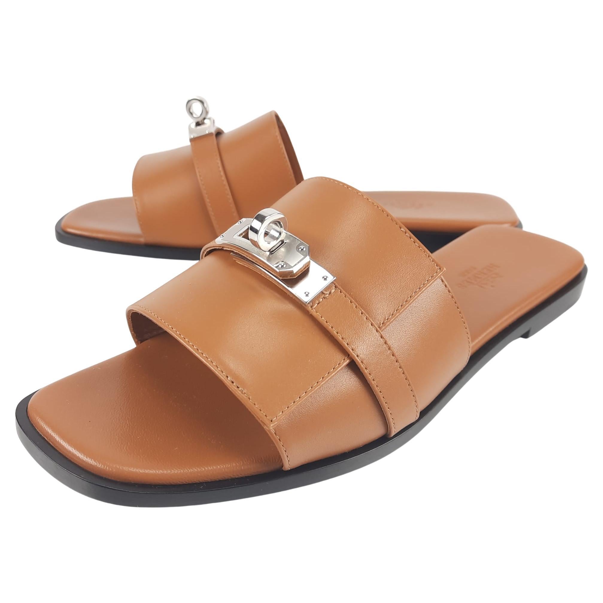 Sz36.5 brand new hermes Oran sandal in ostrich tangerine color