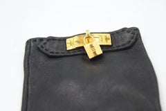 Hermès gloves in black leather with a lock – Size 6.5