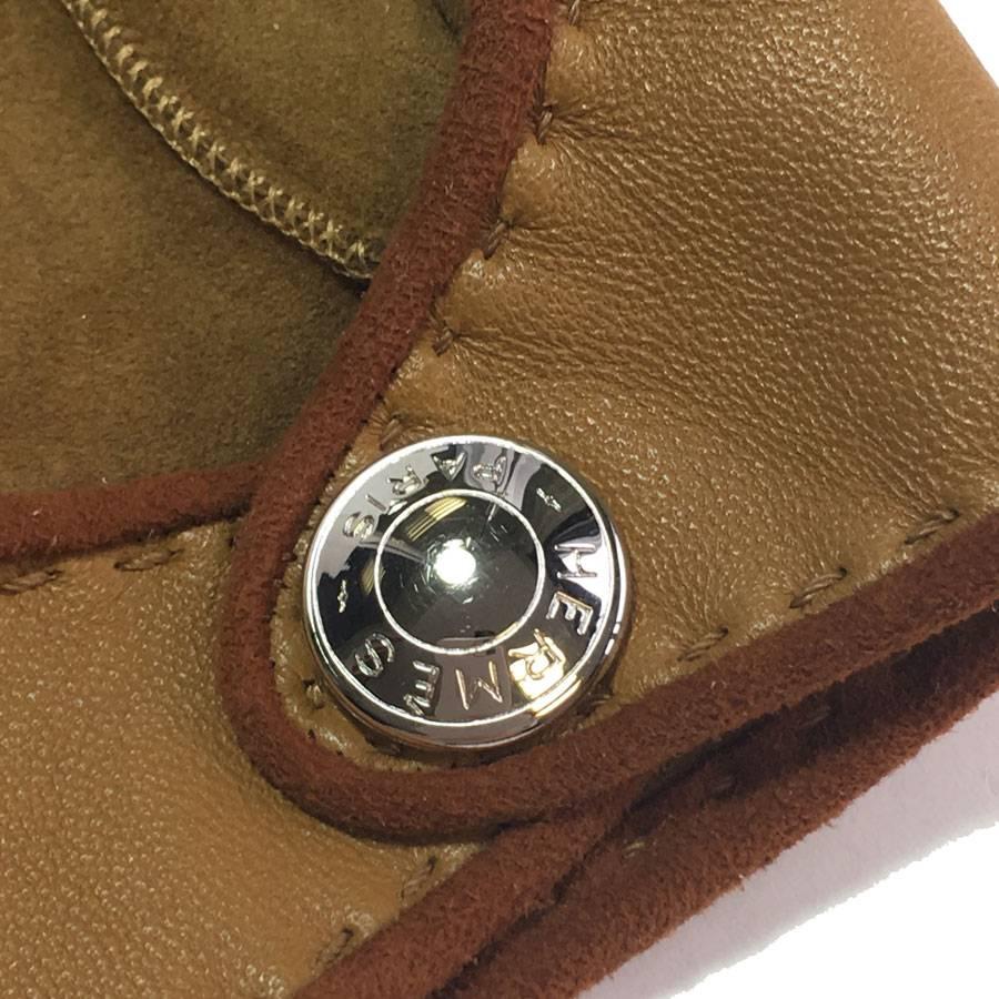  Hermès gloves in glossy kraft and cognac lamb leather. Pressure clasp in palladium metal.

Stamp S from privates sales inside a glove (see photo).

Never worn. Size 7

Will be delivered in a new, non-original dust bag
