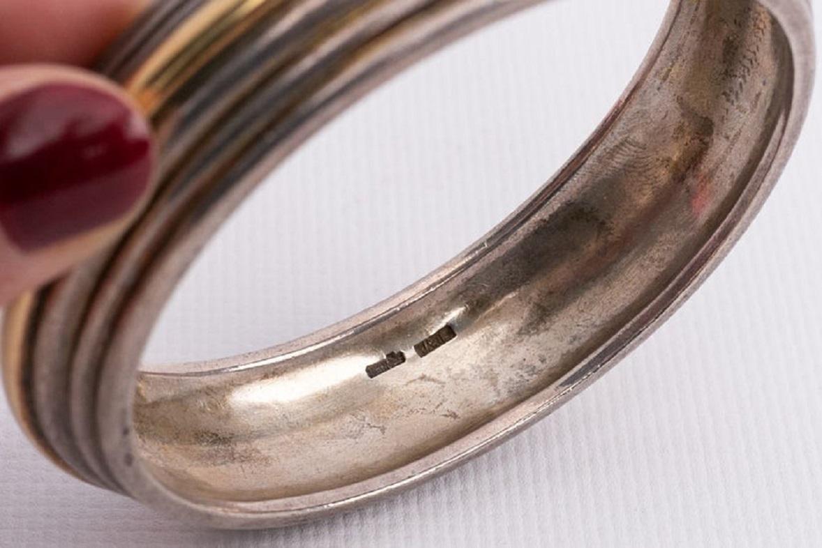 Donna Bracciale Hermès in oro e argento in vendita