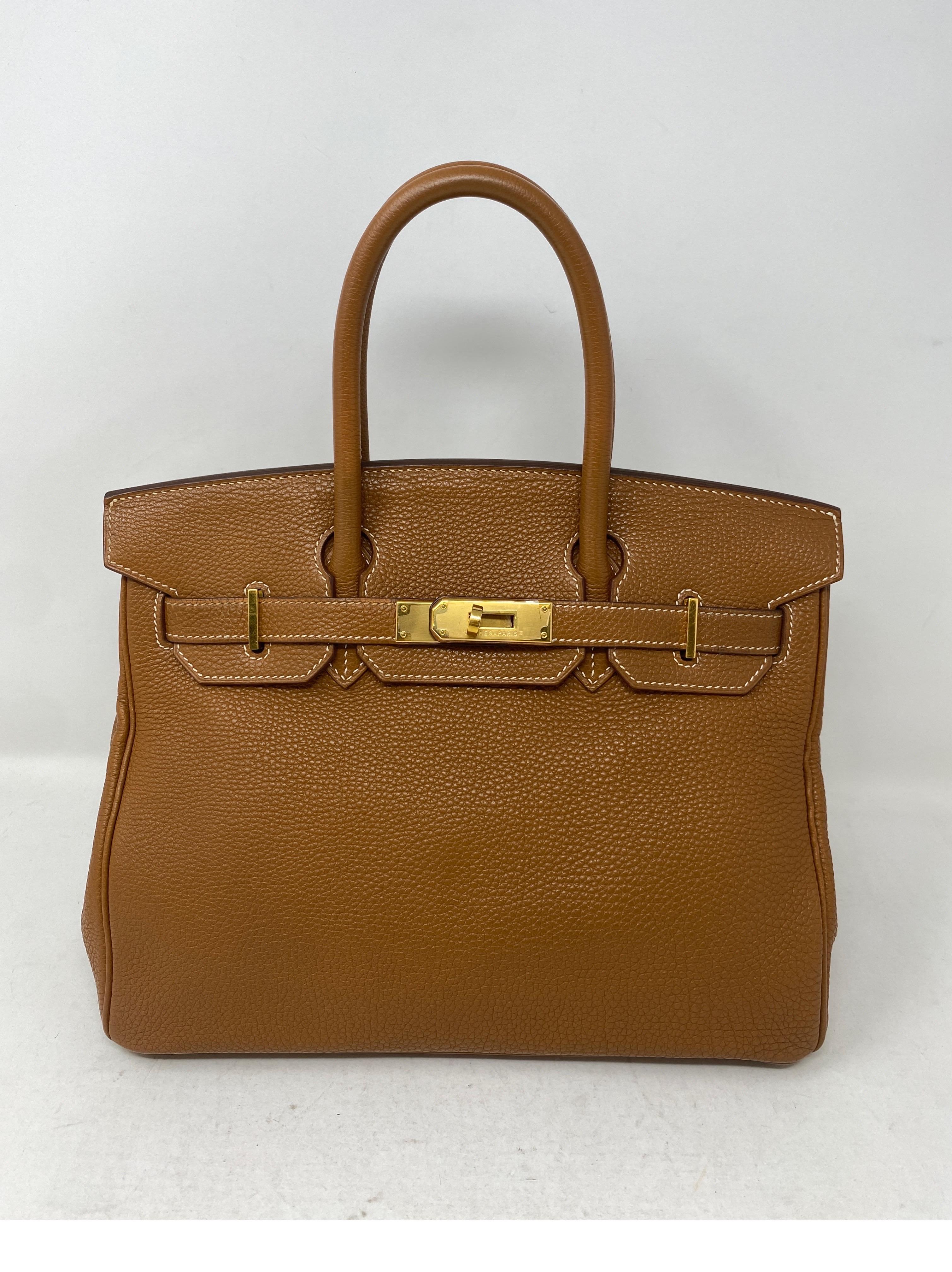 Hermes Gold Birkin 30 Bag. Togo gold leather with gold hardware. Excellent condition. Beautiful gold tan color is a classic. Includes clochette, lock, keys, and dust cover. Guaranteed authentic. 