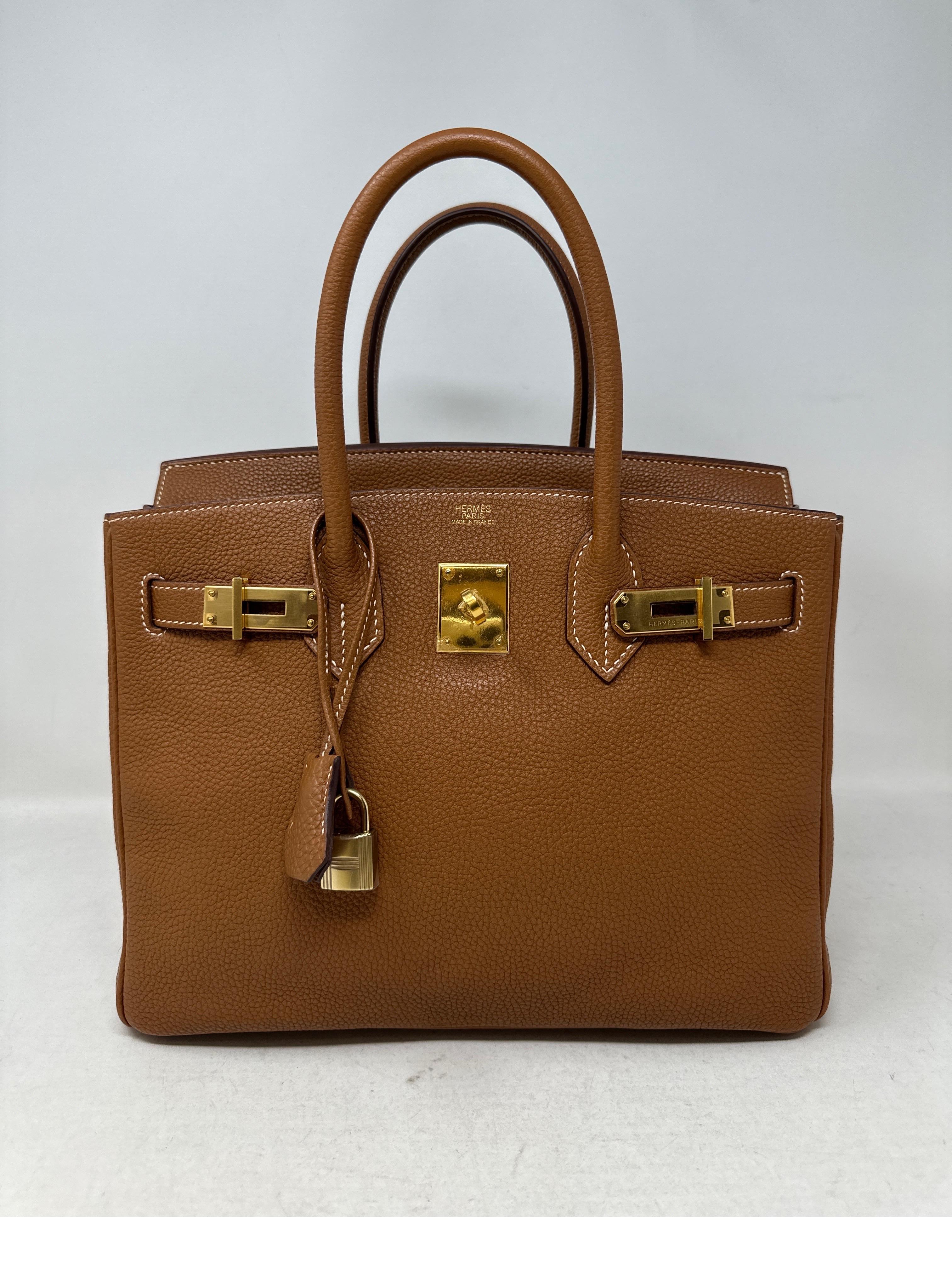 Hermes Gold Birkin 30 Bag. Excellent condition. Most wanted color gold with gold hardware. Rare combination to find. Interior clean. Togo leather. Includes clochette, lock ,keys, and dust bag. Guaranteed authentic. 