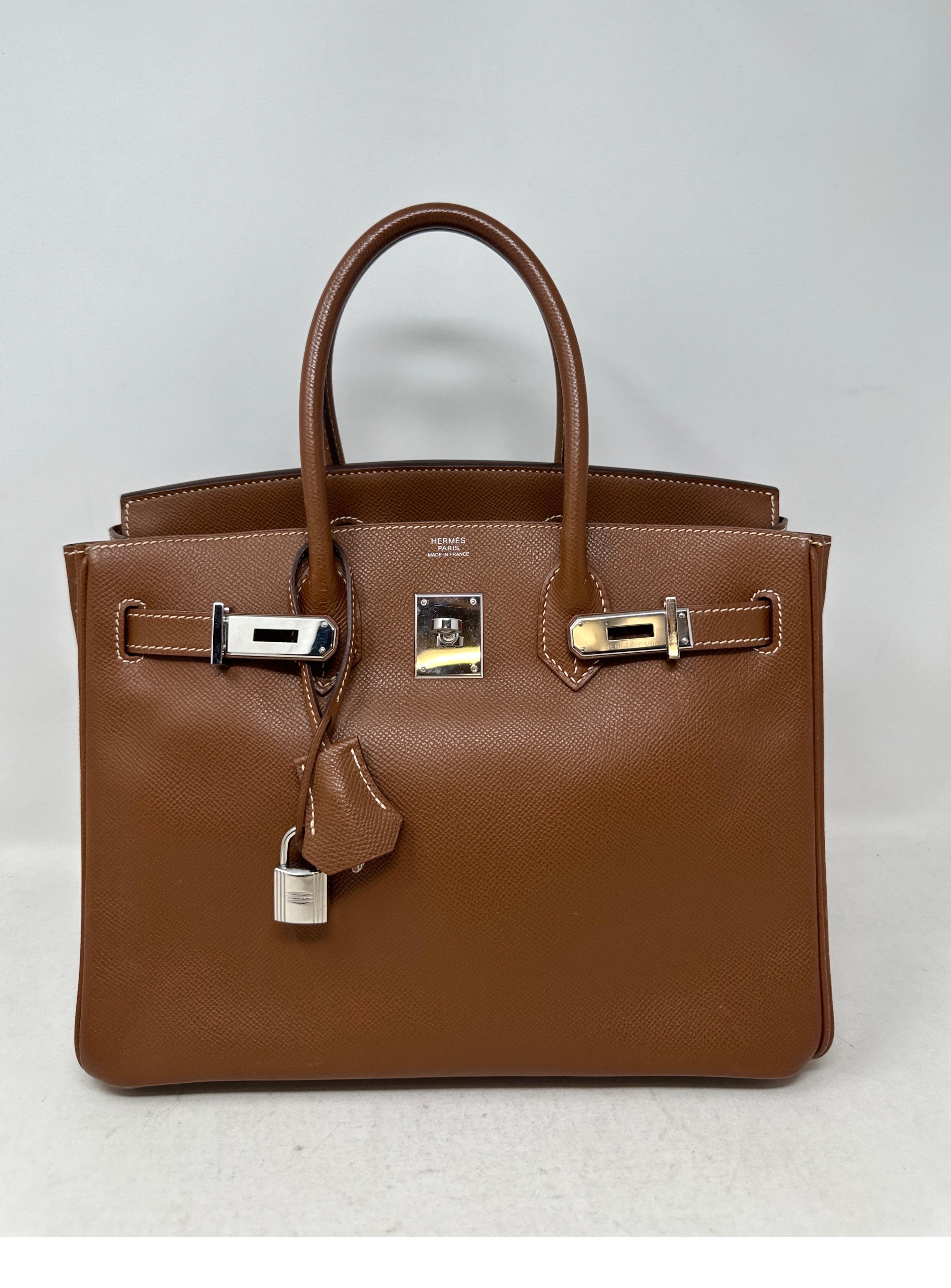 Hermes Gold Birkin 30 Bag. Epsom leather. Palladium silver hardware. Very good condition. Classic color and size. Neutral will go with everything. Interior clean. Includes clochette, lock, keys, and dust bag. Guaranteed authentic. 
