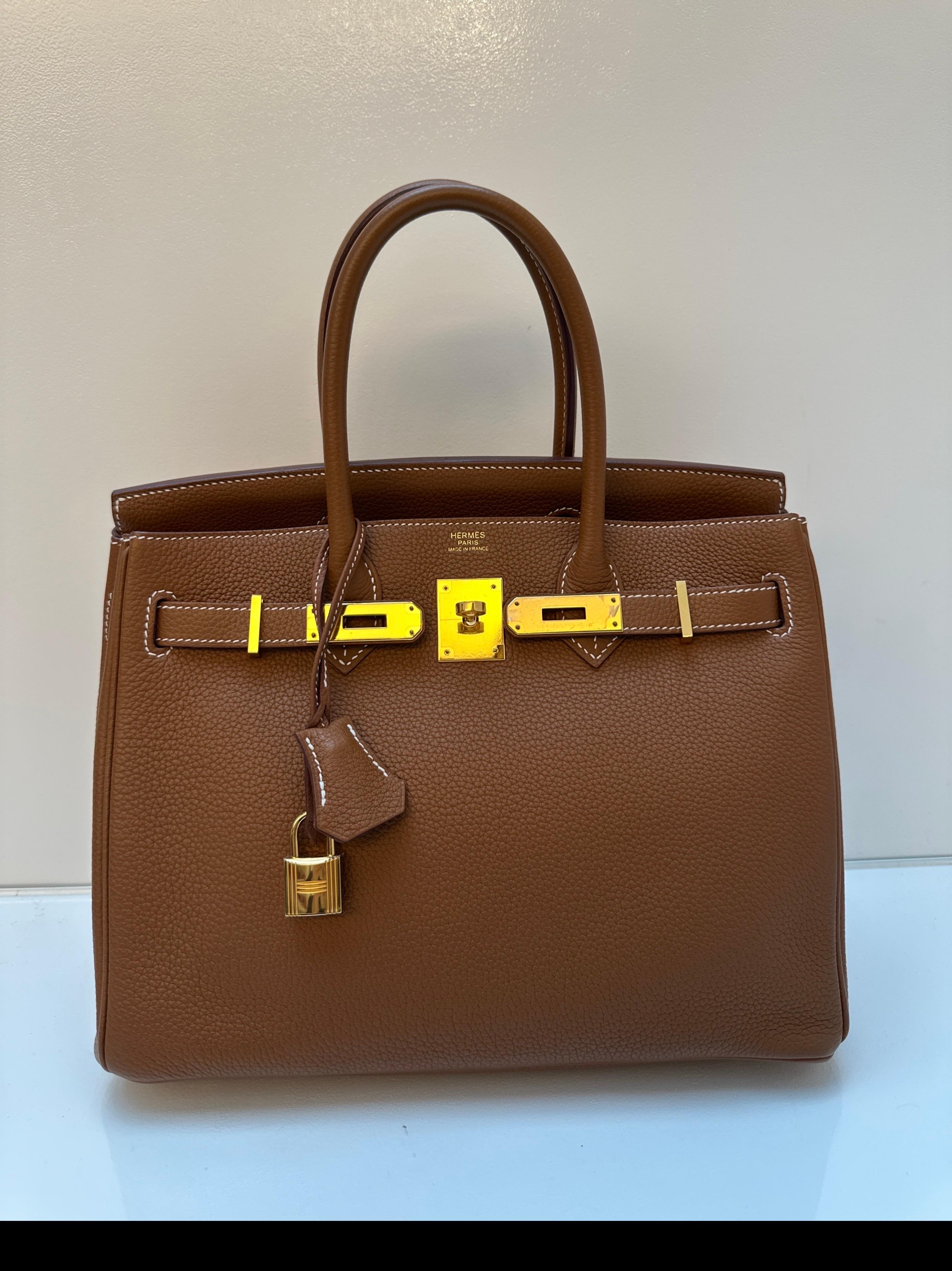 Hermes Gold Birkin 30 Bag. Excellent condition. Gold hardware. Interior clean. Looks like new. Most wanted size and color gold tan. Great investment bag. Includes clochette, lock, keys, and dust bag. Guaranteed authentic. 