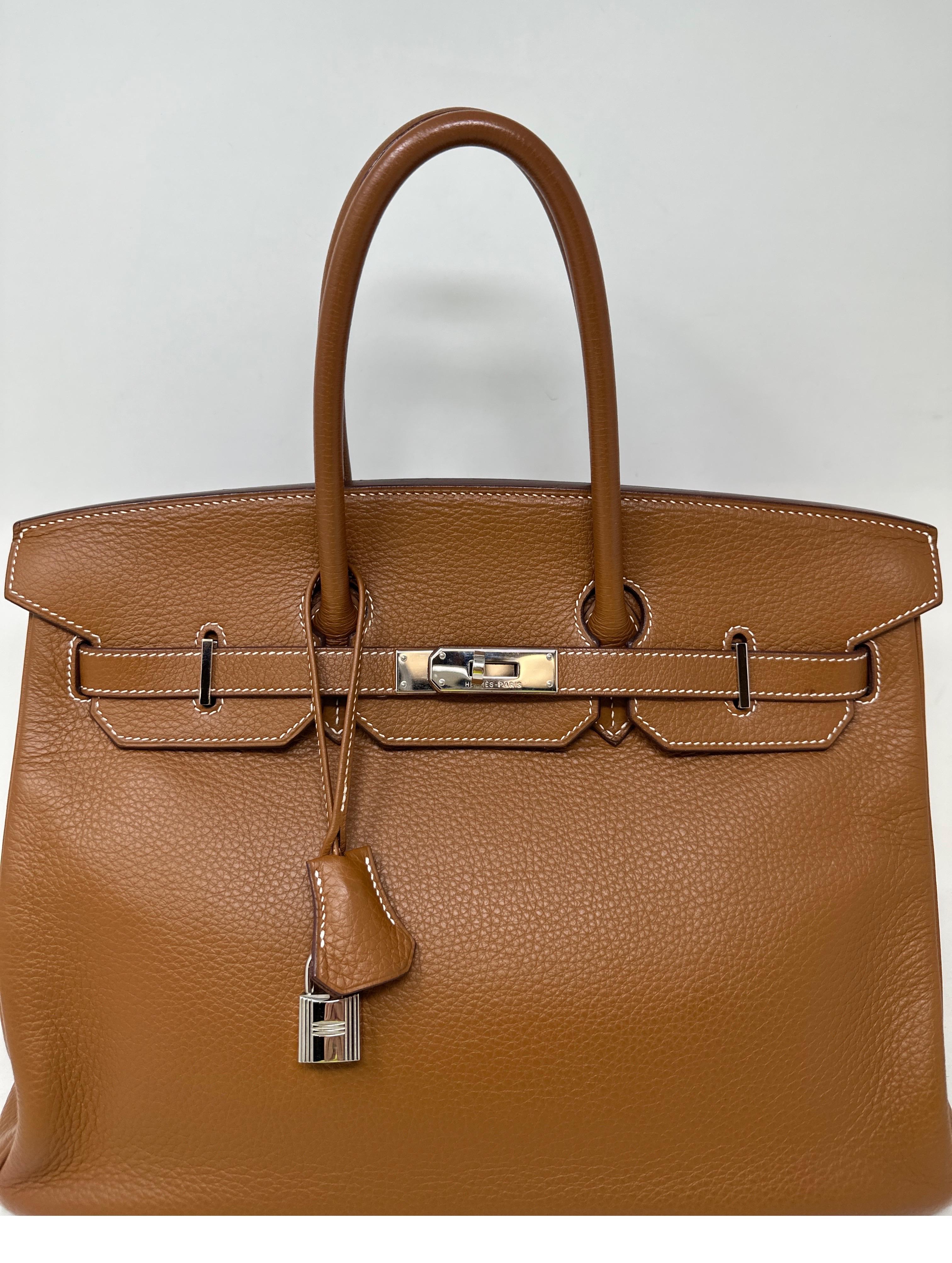 Hermes Gold Birkin 35 Bag. Palladium silver hardware. Excellent condition. Interior clean. Gold tan color leather. Classic bag. Great investment bag. Includes clochette, lock, keys, and dust bag. Guaranteed authentic. 