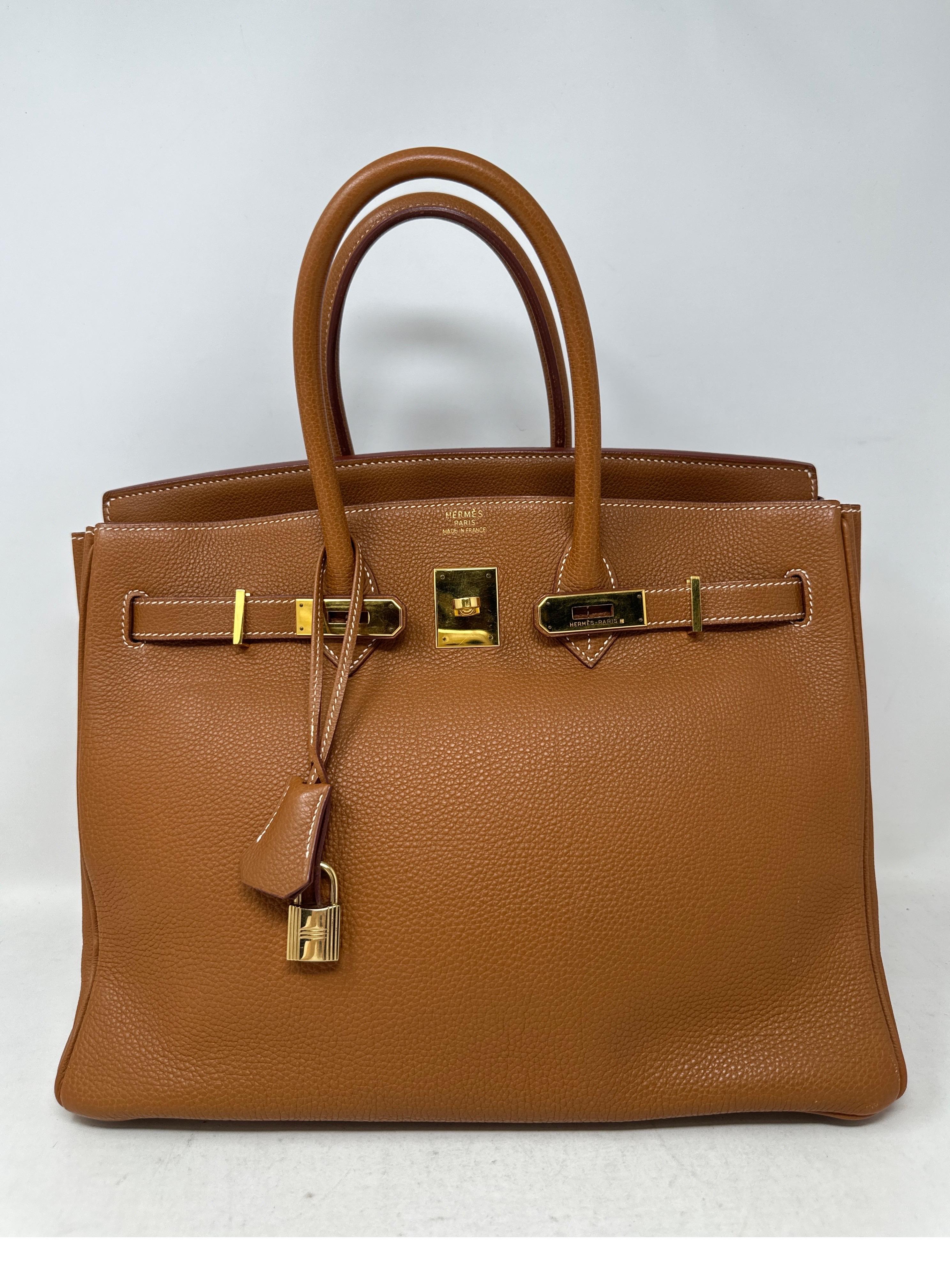 Hermes Gold Birkin 35 Bag. Clemence leather. Gold hardware. Most wanted combination. Classic bag. Interior clean. Good condition. Includes clochette, lock, keys, and dust bag. Guaranteed authentic. 