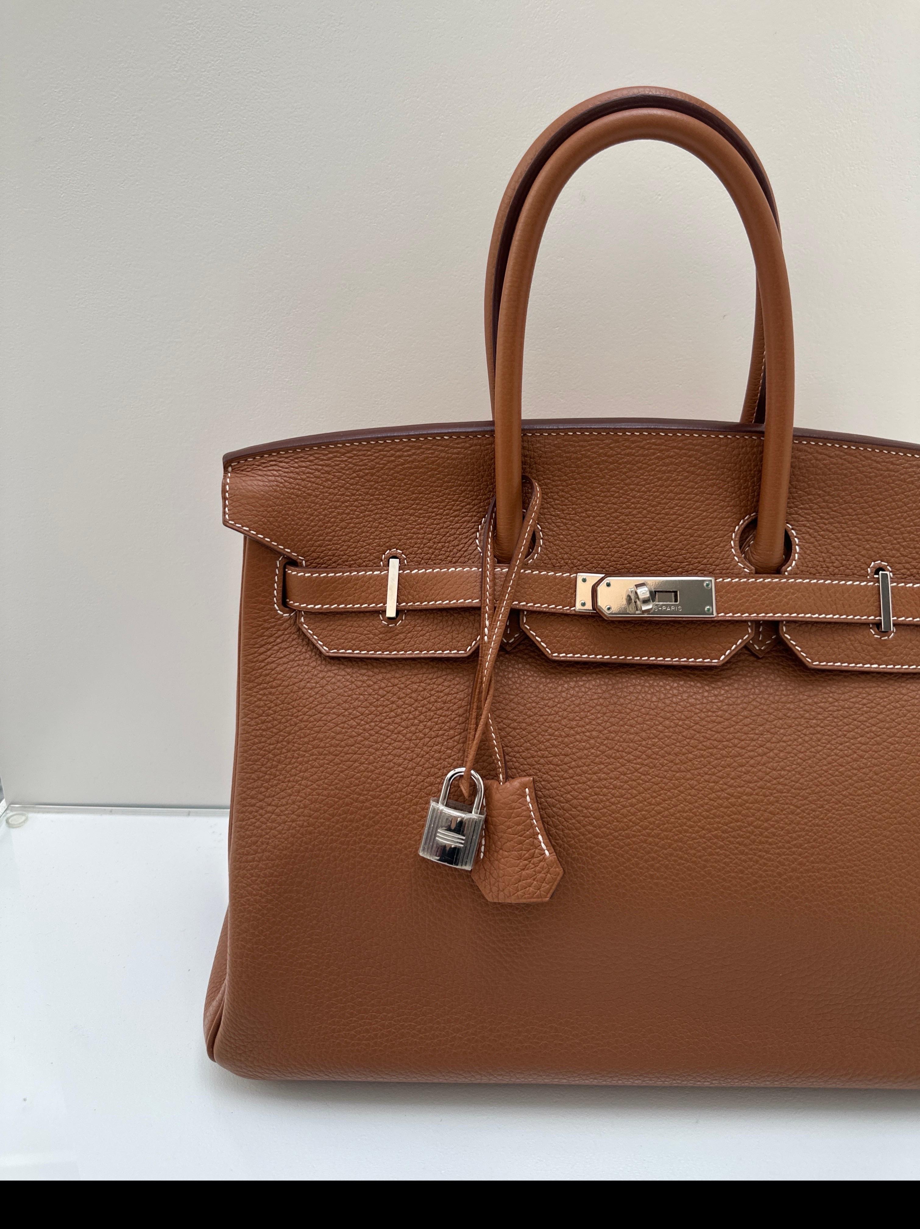 Hermes Gold Birkin 35 Bag. Excellent condition. Looks like new. Most wanted gold tan color. Palladium silver hardware. Togo leather. Great investment bag. Interior clean. Includes clochette, lock, keys, and dust bag. Guaranteed authentic. 