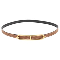 Ceinture réversible Roulis d'Hermès en cuir Epsom et cuir Swift or/noir 70 cm