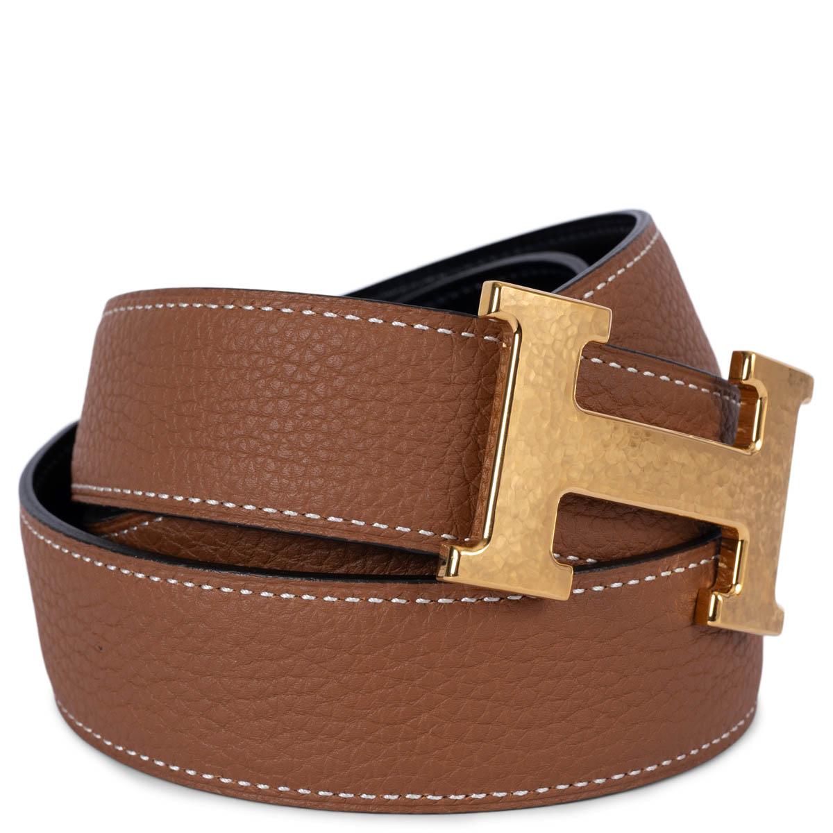 100% authentic Hermès H Martelee reversible belt in black Box leather and Gold (camel) Togo leather with gold-tone hammered buckle. Brand new. Comes with box and dust bag. 

Measurements
Tag Size	90
Width	3.2cm (1.2in)
Fits	87cm (33.9in) to 92cm