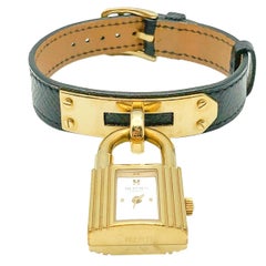 Hermès Gold & Montre Kelly en cuir noir 2000