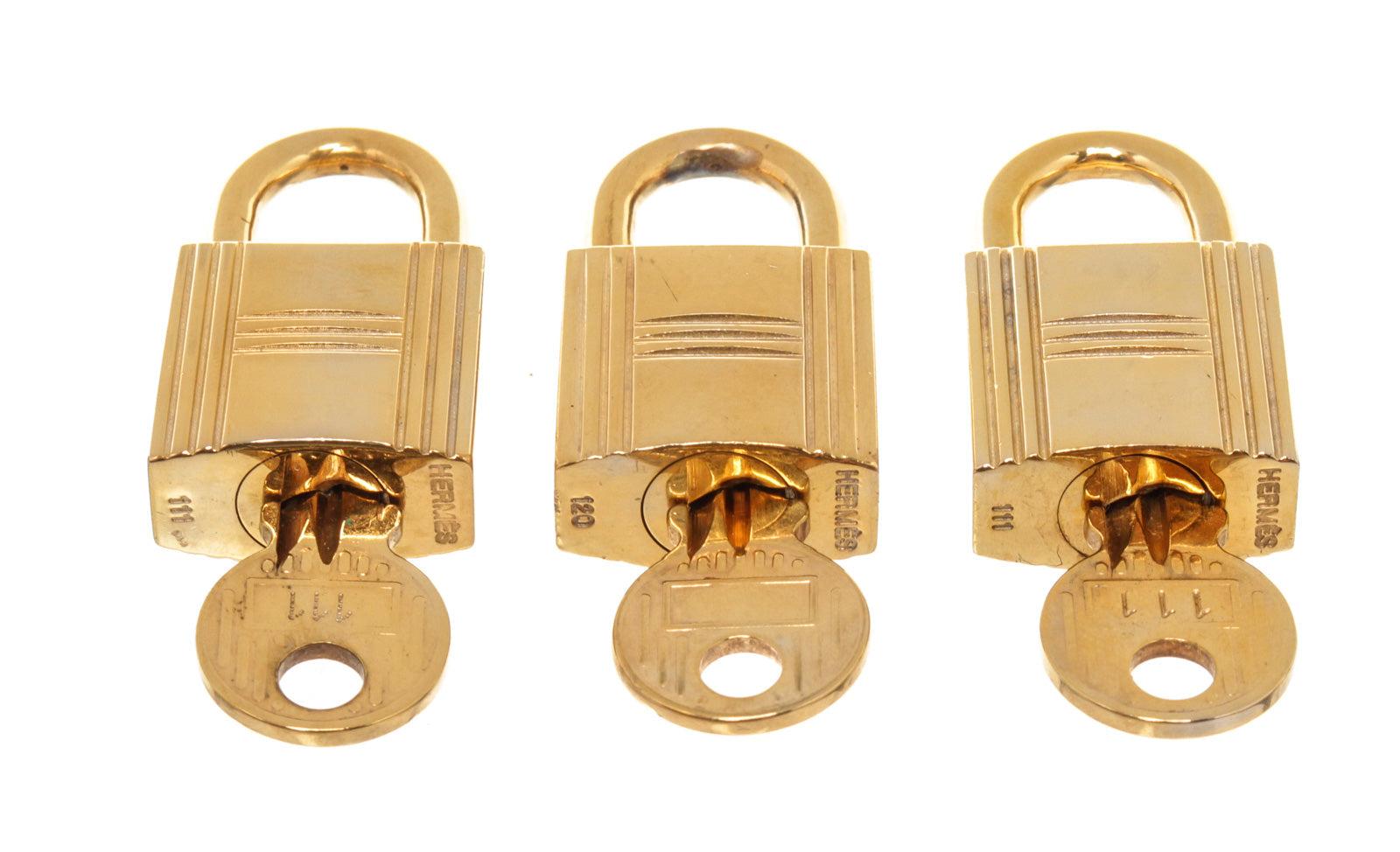 Hermes Gold Cadena Lock Schlüsselanhänger-Set mit Gold-Hartware und gedrehtem Schlossverschluss (Braun)