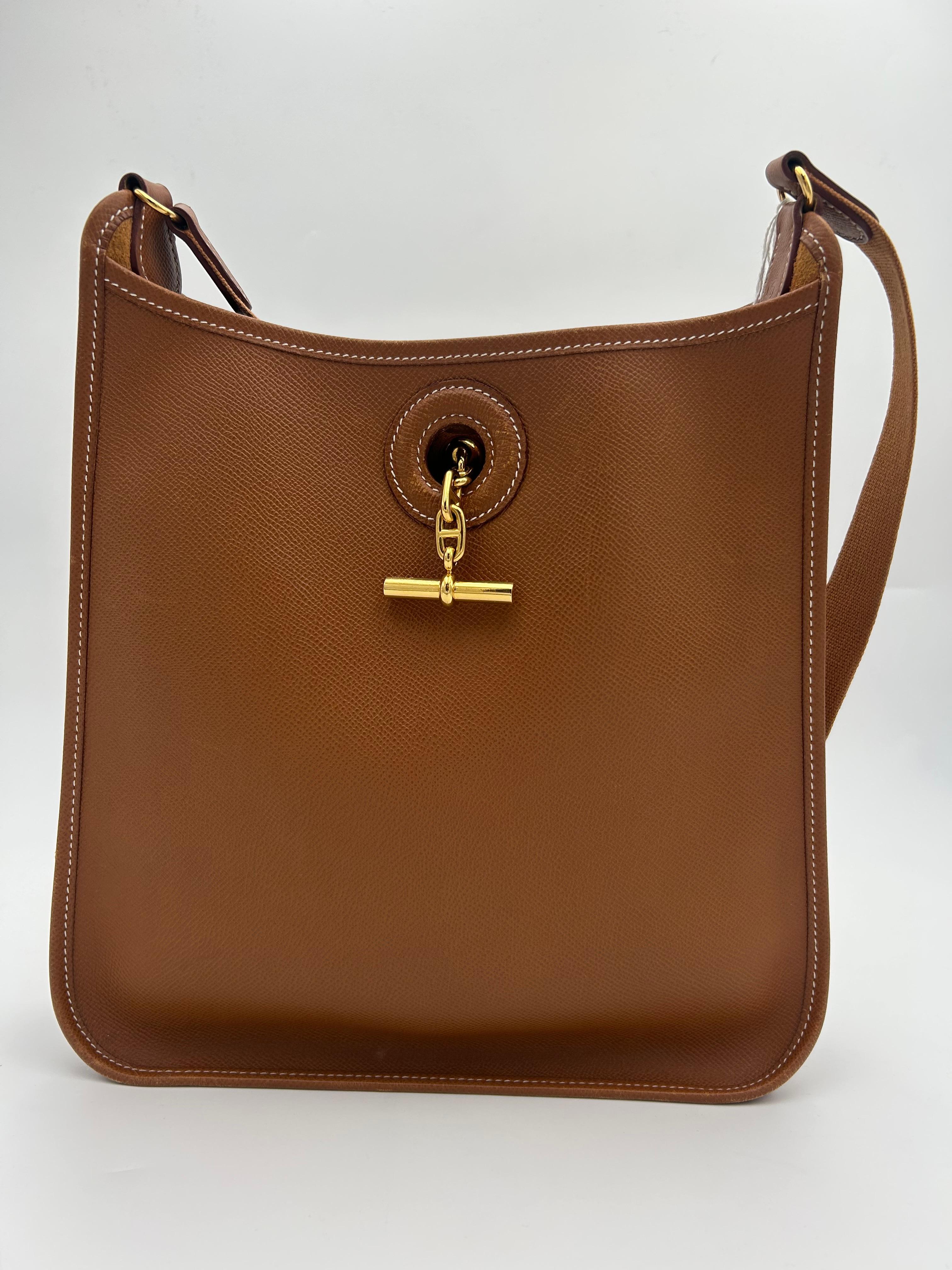 Hermès Gold Camel Leather Vespa Bag. Please note this item is in good condition with minor wear consistent with age and use ( Can be seen on the pictures. )
Beautiful bag, worn as a crossbody, with gold toned silverware. Easy big opening, practical