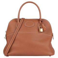 Bolide 31 de Hermès en piel Clemence dorada