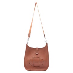 Hermes gold clemence leather Evelyn 1 PM bag with silver-tone hardware, tonal