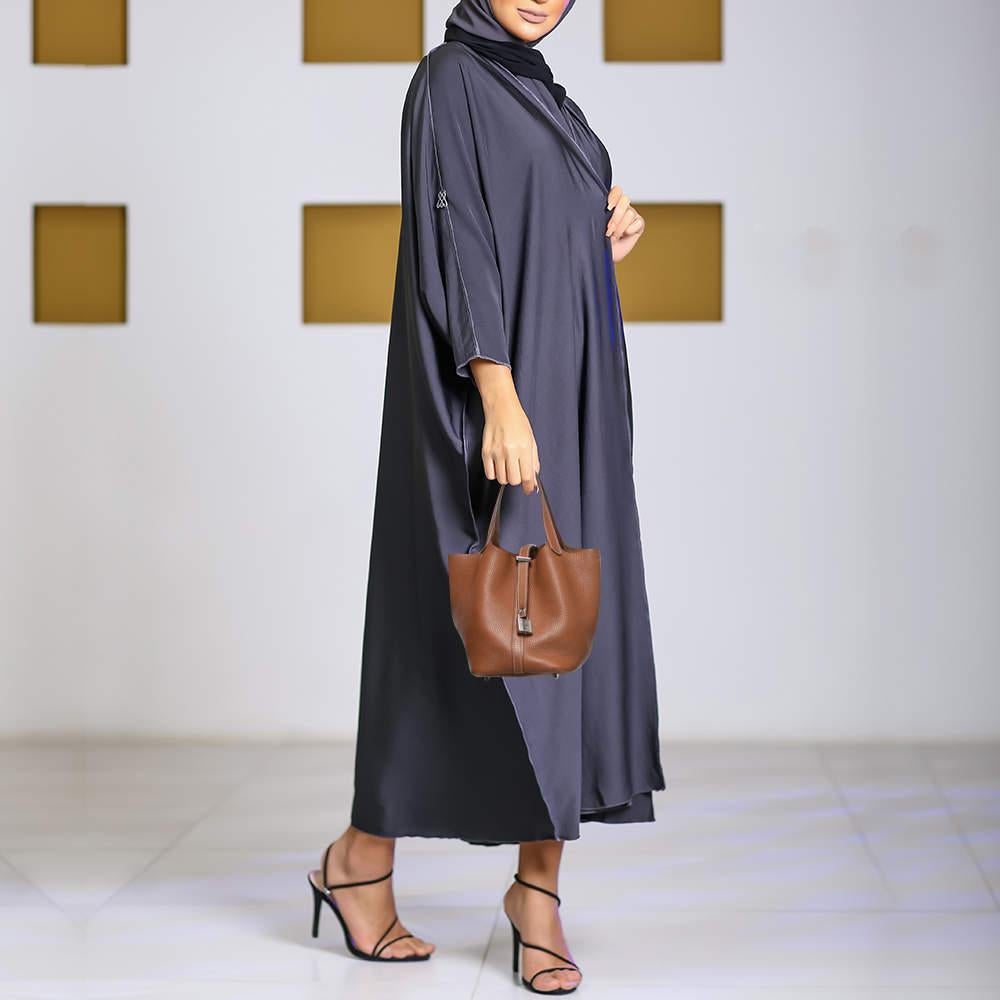 Wonderfully crafted from Clemence leather, this Hermes Picotin Lock 18 is a creation for people who love a blend of luxury and style. It comes in a grand color, and it sits in a relaxed shape with two handles and a roomy interior.

Includes: