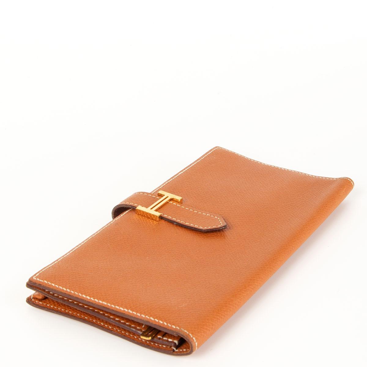 100% authentic Hermès 'Bearn' wallet in Gold Epsom with gold-tone hardware. Has been carried with natural patina and some faint signs of wear. Overall in very good condition. 

Width 17cm (6.6in)
Height 9cm (3.5in)
Depth 2cm (0.8in)
Hardware