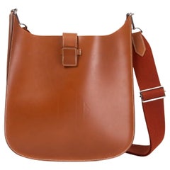 HERMÈS Sac de chasse EVELYNE 29 en cuir cognac doré avec détails en palladium