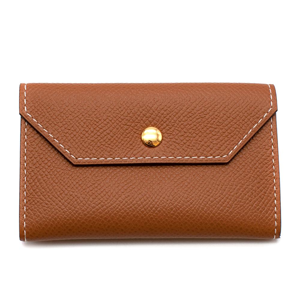 Hermes Gold Kelly Micro Pocket Belt with Gold Hardware 

Leather belt in Epsom calfskin with gold plated Kelly buckle. Removable pouch with a belt loop that can be paired with any 13 mm leather strap
Thanks to a clever sliding system, this