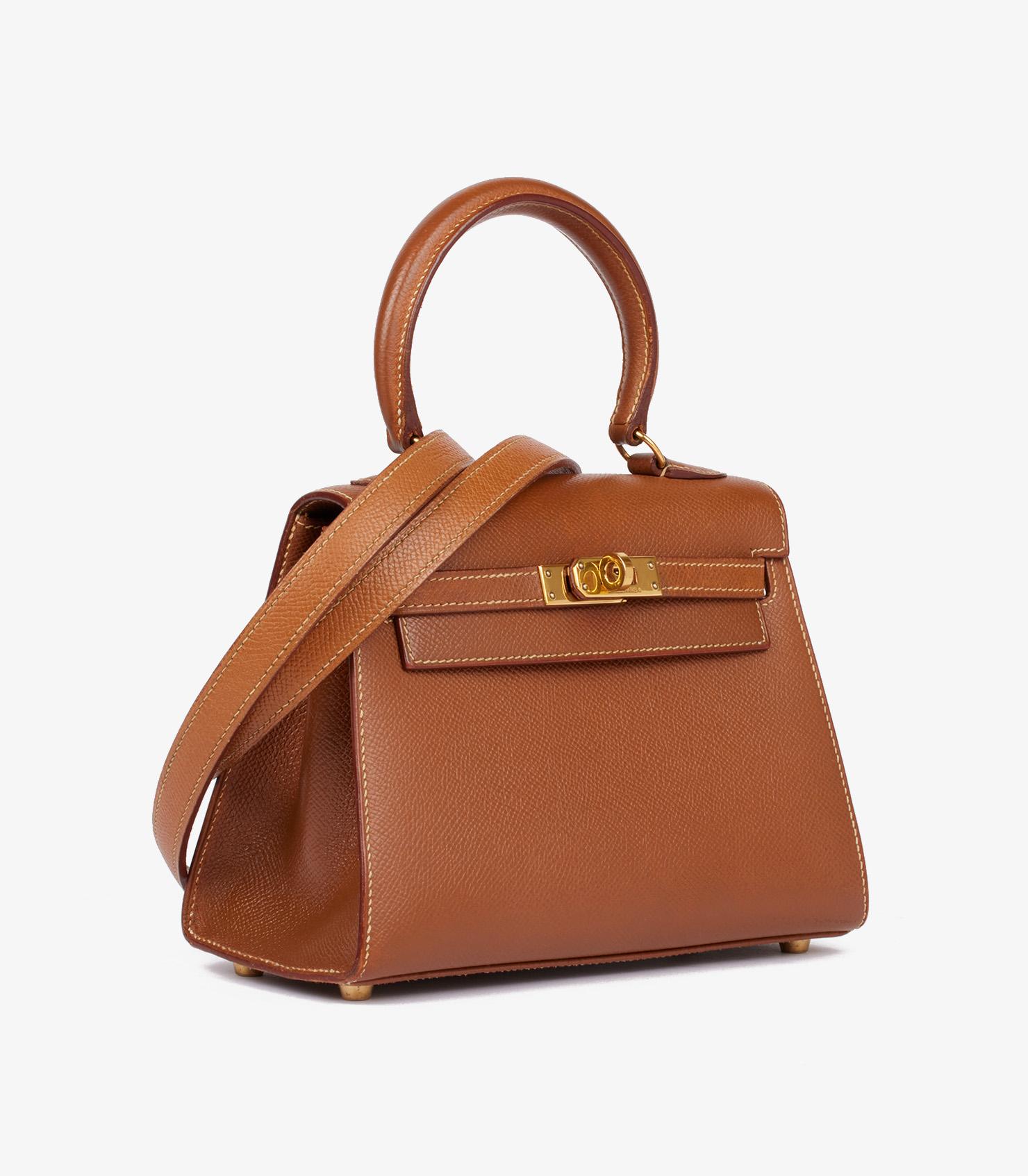 Hermès Gold Courchevel Leather Vintage Kelly 20cm

Brand- Hermès
Model- Kelly 20cm
Product Type- Top Handle
Serial Number- (X*
Age- Circa 1994
Accompanied By- Hermès Dust Bag, Shoulder Strap, Box, Ribbon
Colour- Gold
Hardware- Gold
Material(s)-