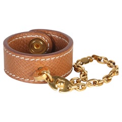 Hermès Gold Courchevel Nomad Glove Holder