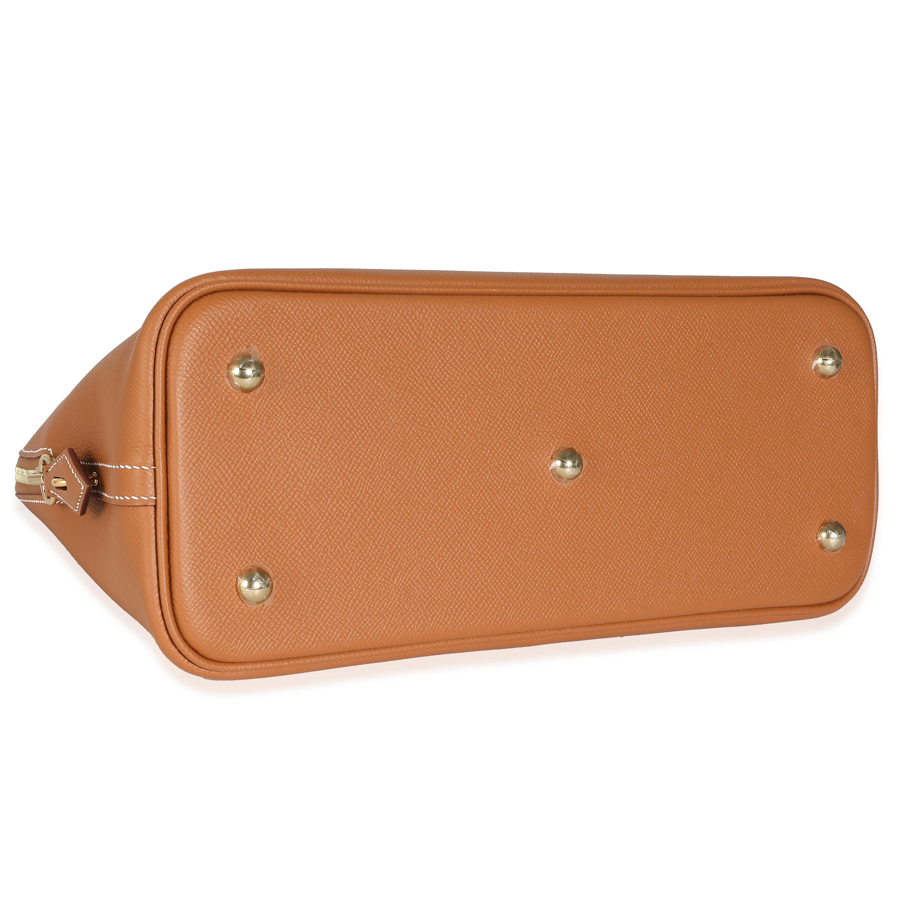 Listing Title: Hermès Gold Epsom 1923 Bolide 31 GHW
SKU: 138078
MSRP: 8750.00 USD
Condition: Pre-owned 
Handbag Condition: Excellent
Condition Comments: Item is in excellent condition and displays light signs of wear. Plastic along feet. Light
