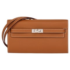 HERMÈS Portefeuille long Kelly To Go en cuir or Epsom