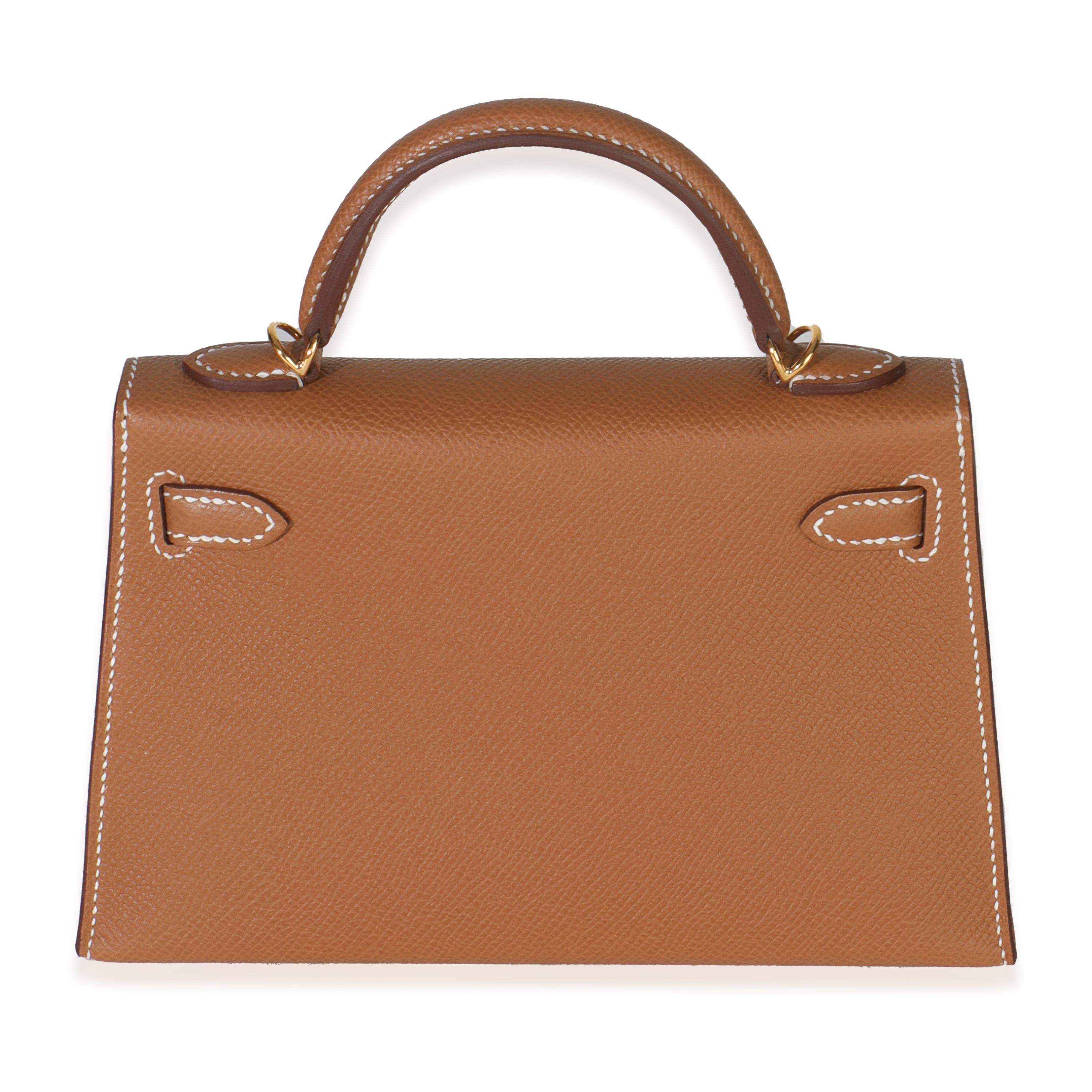 Listing Title: Hermès Gold Epsom Mini Kelly 20 II GHW
SKU: M149689
Condition: Pre-owned 
Condition Description: Officially renamed in 1977, the Hermès Kelly was originally called the Sac à Dépêches (which translates to ‘the dispatch bag’). The