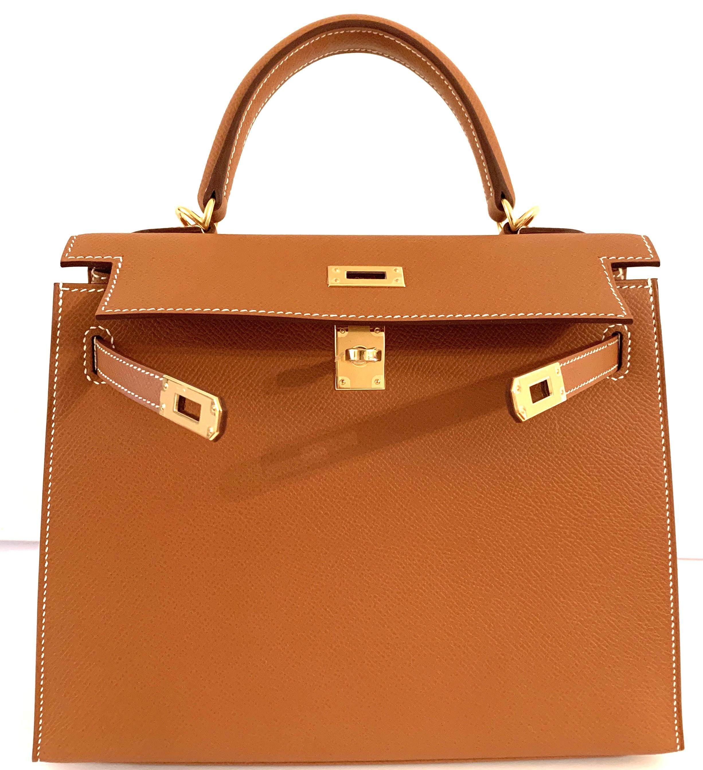 Hermes 25cm Kelly
Hermes Kelly 25cm
Never worn, plastic on the hardware including shoulder strap hardware
One of the hottest bags in the market right now
Gold Epsom in size 25 Sellier, almost impossible to find
We have it!

Gold Color
Gold